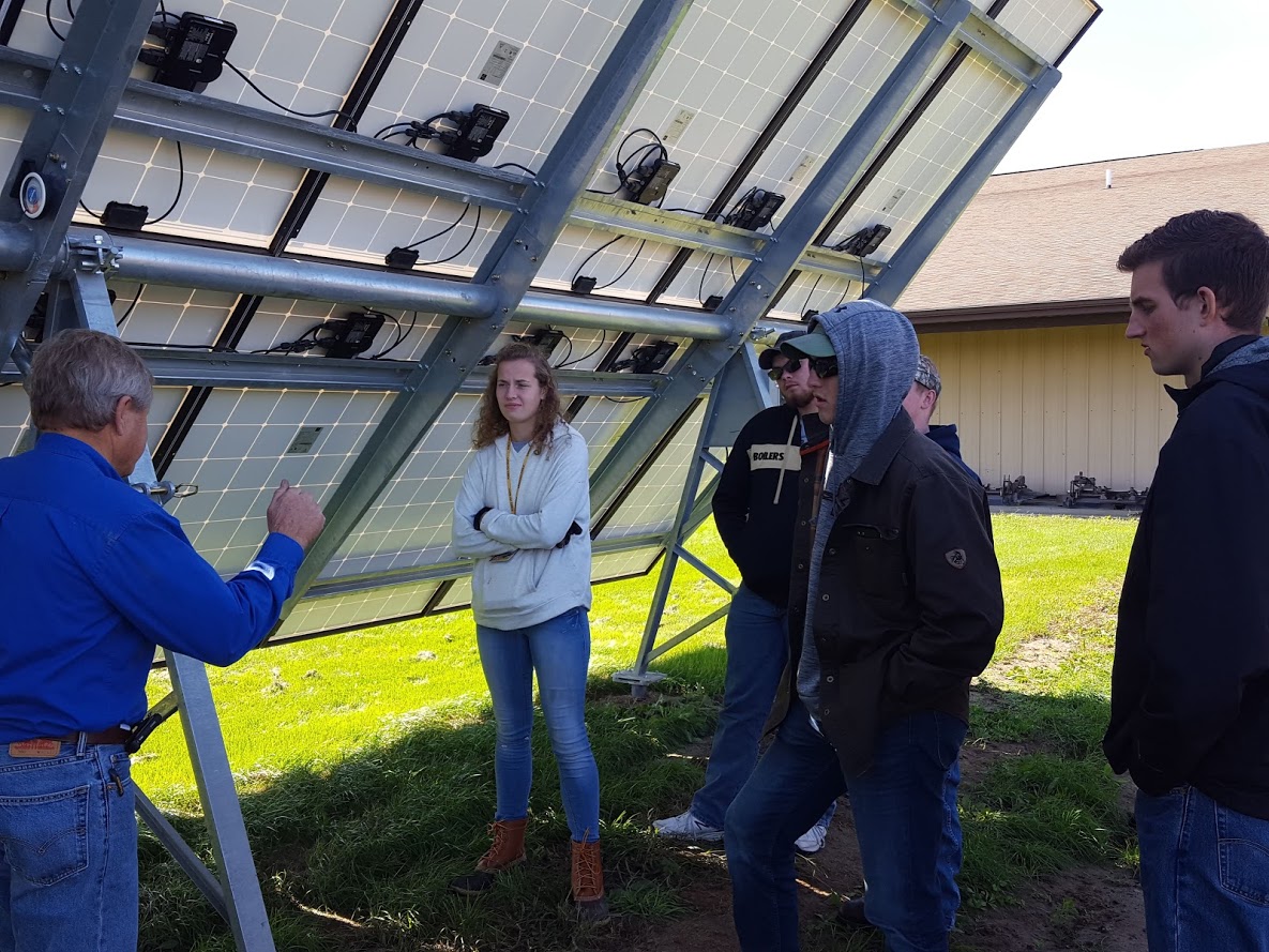 Students at solar panel